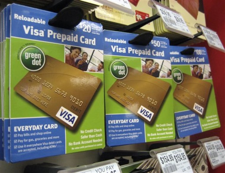 Visa prepaid cards are shown at a Duane Reade drug store in New York. A federal study last year found that about one in four U.S. households skirts banks and relies on services such as check-cashing and payday loans.